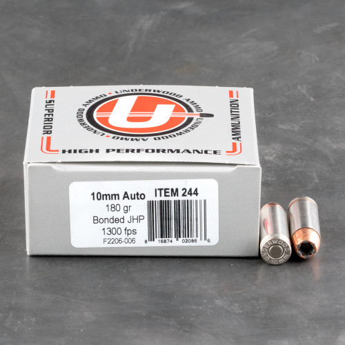 10mm 180 grain JHP @ 1,300fps.